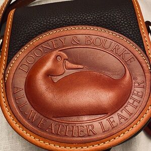 Dooney & Bourke Deep Dark Brown Crossbody Bag with Embossed Leather Patch